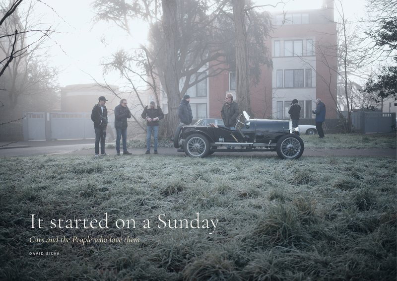 The cover of It Started on a Sunday: owners around a vintage racing car on frosted grass in fog.